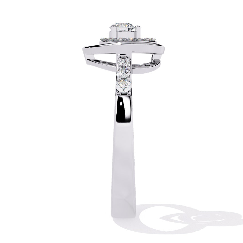 A beautifully crafted gold ring in the shape of a heart, embellished with a radiant diamond studded heart and center stone, representing love.
