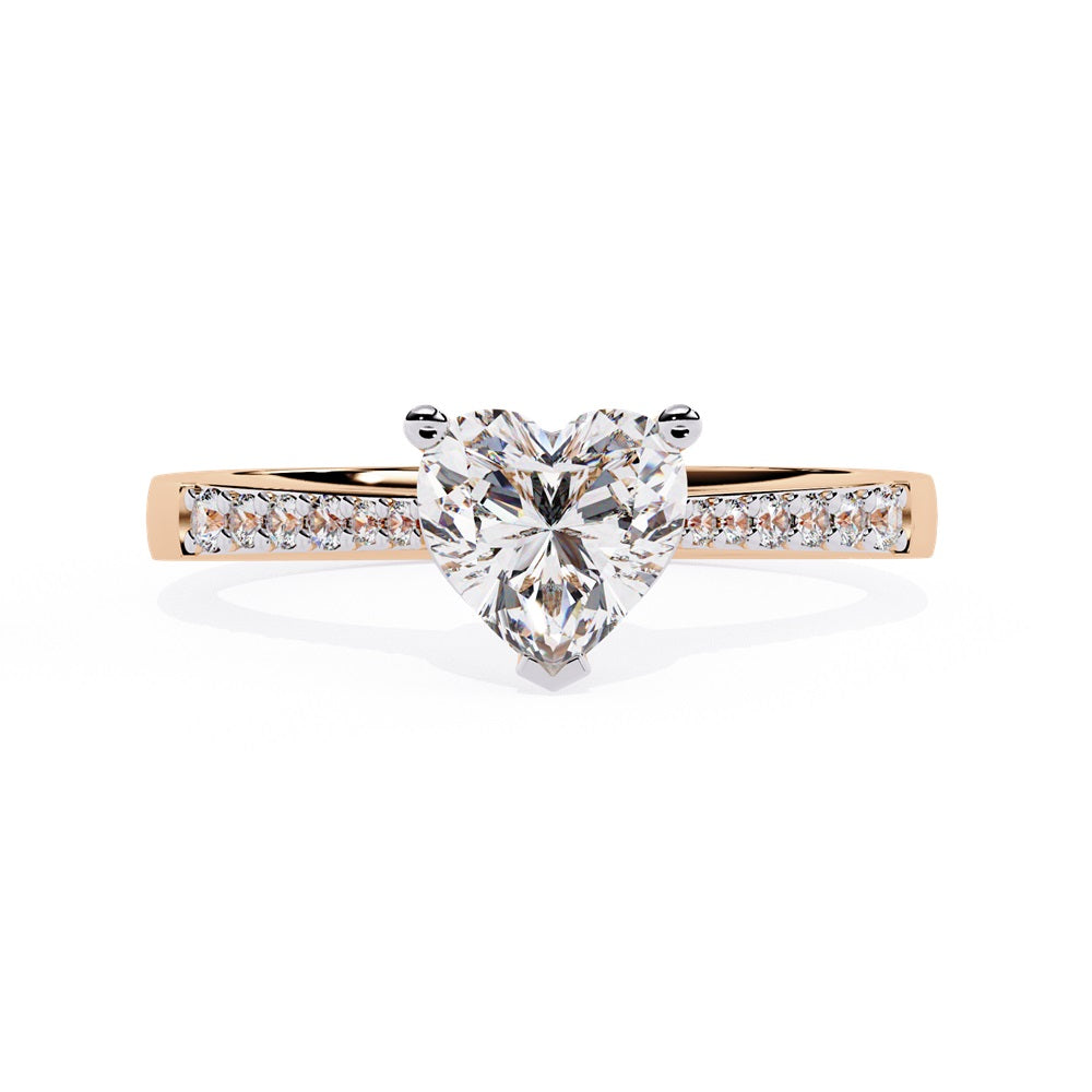 Elegant heart-shaped diamond engagement ring crafted in gold, representing everlasting love.