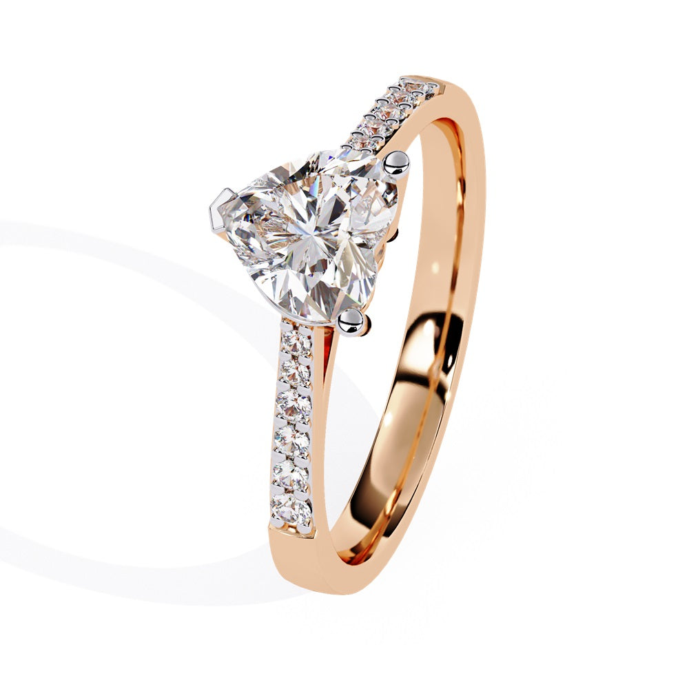 Elegant heart-shaped diamond engagement ring crafted in gold, representing everlasting love.