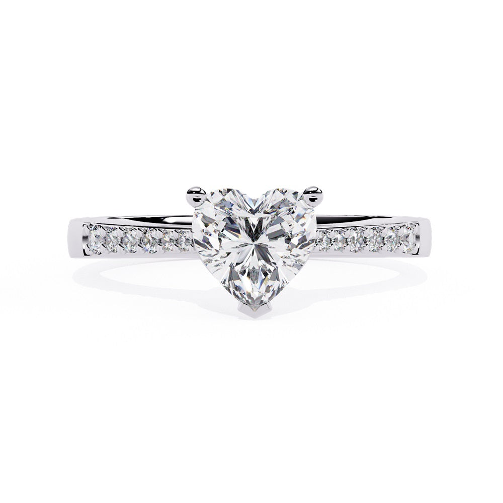 Elegant heart-shaped diamond engagement ring crafted in gold, representing everlasting love.