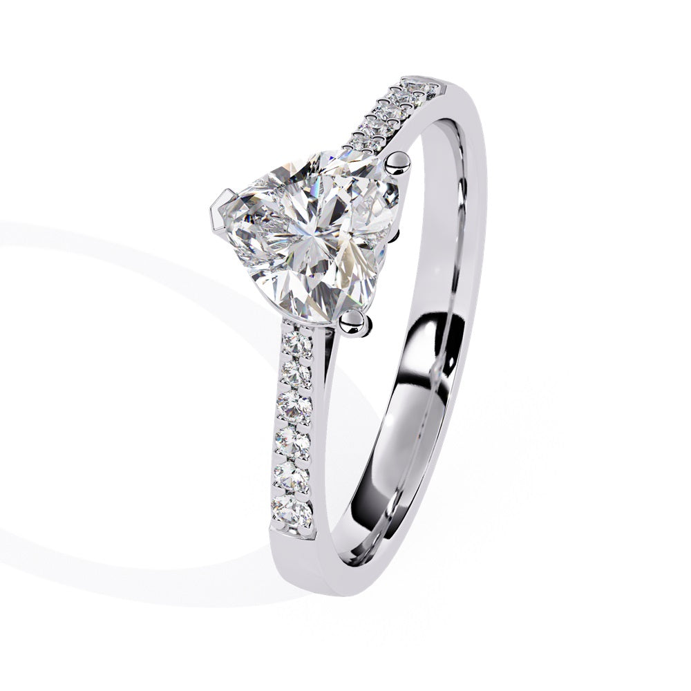 Elegant heart-shaped diamond engagement ring crafted in gold, representing everlasting love.