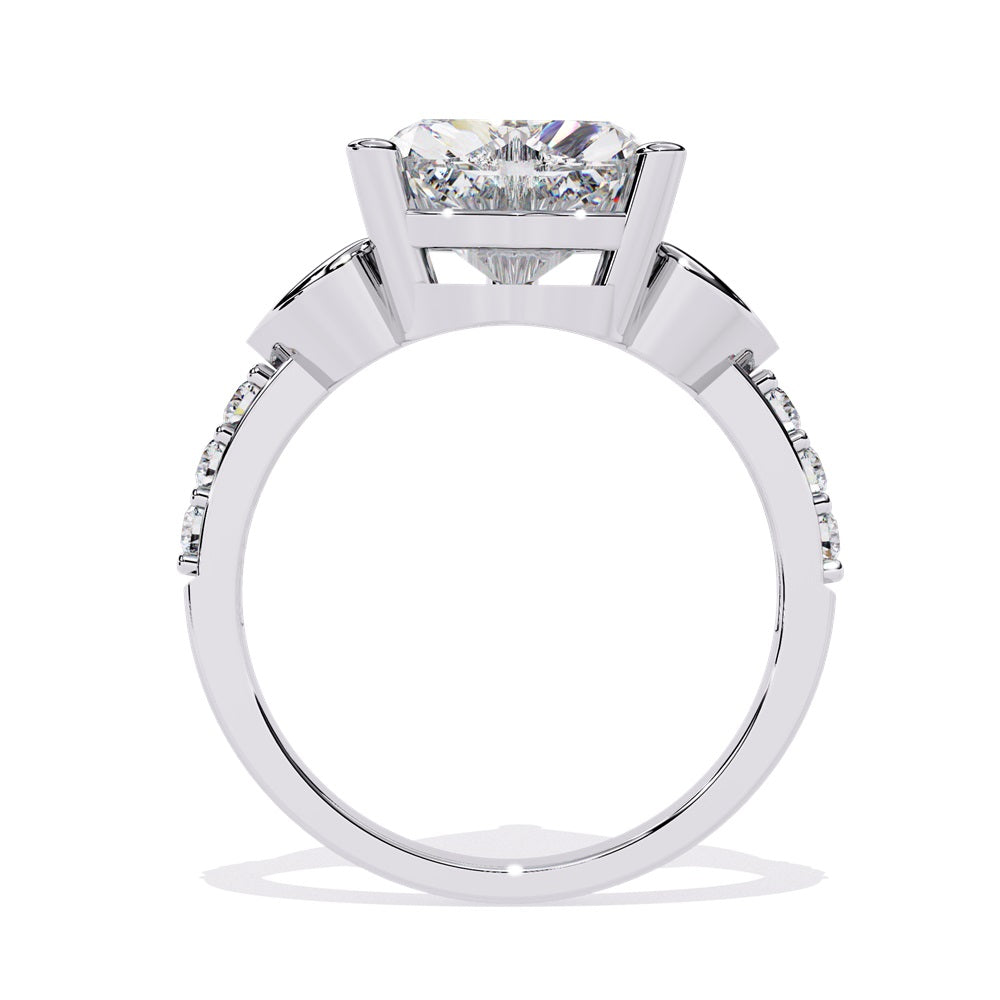 A stunning heart-shaped diamond engagement ring in gold featuring two gold hearts on either sides, perfect for a romantic proposal.