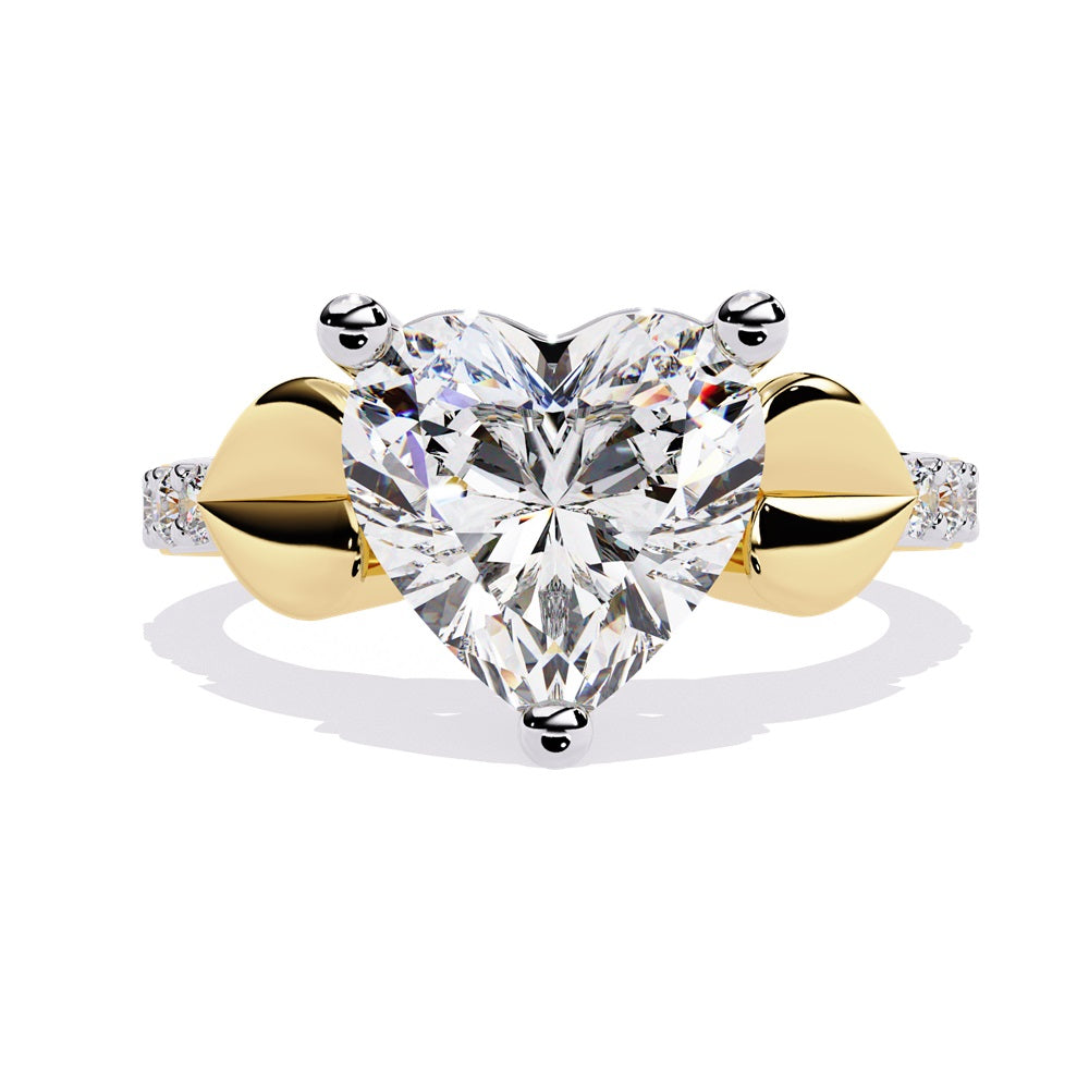 A stunning heart-shaped diamond engagement ring in gold featuring two gold hearts on either sides, perfect for a romantic proposal.