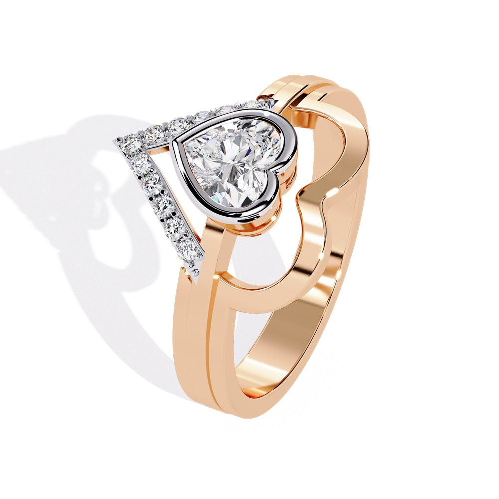 A heart-shaped diamond ring in gold, featuring a solitaire design with a gold halo surrounding it.