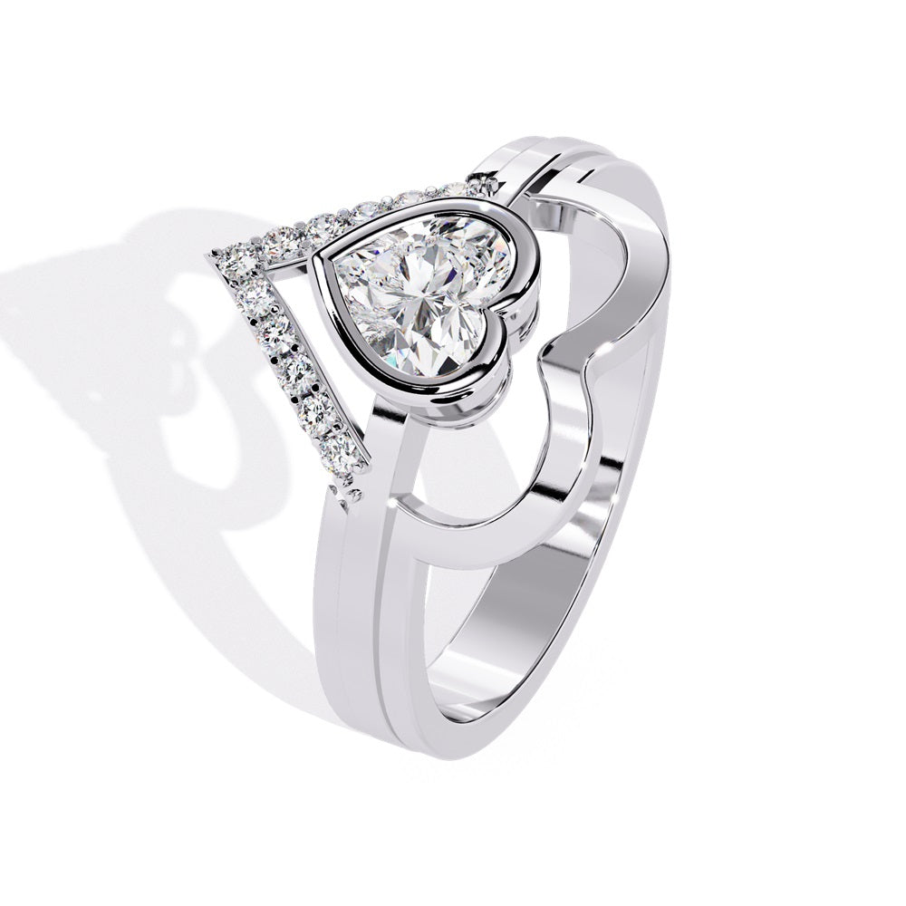 A heart-shaped diamond ring in gold, featuring a solitaire design with a gold halo surrounding it.