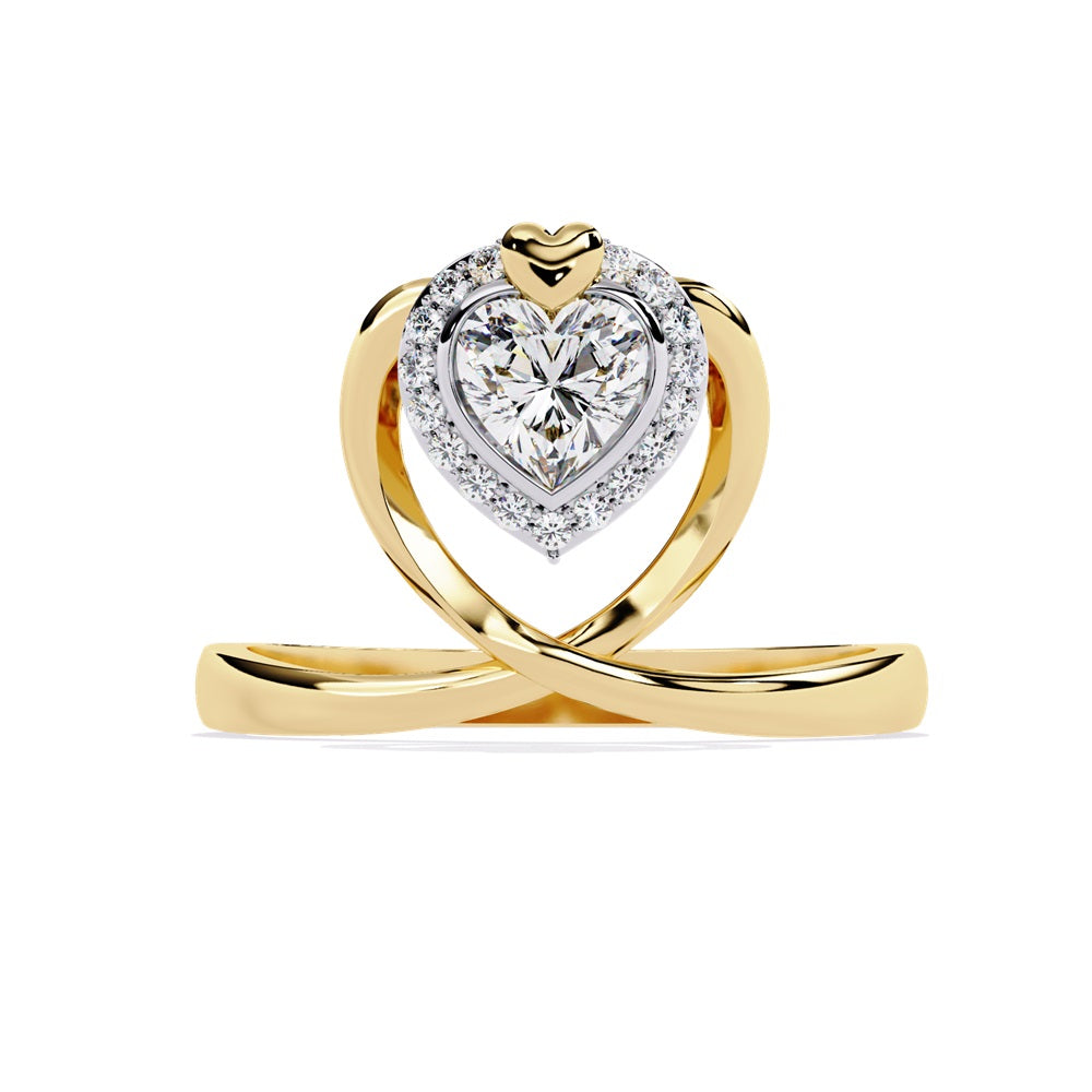 A heart-shaped diamond ring in gold, featuring a solitaire design with a halo of smaller diamonds surrounding it.