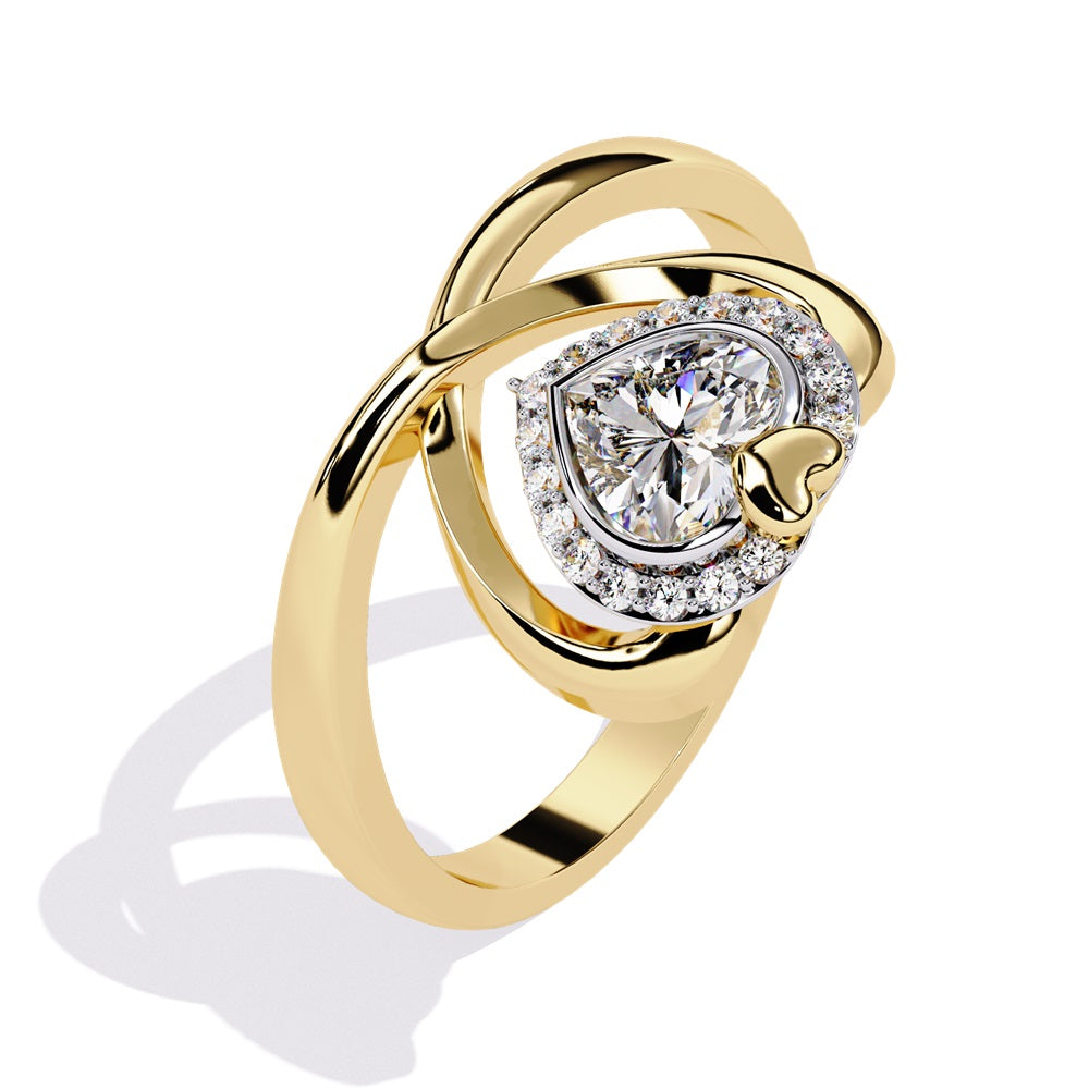 A heart-shaped diamond ring in gold, featuring a solitaire design with a halo of smaller diamonds surrounding it.
