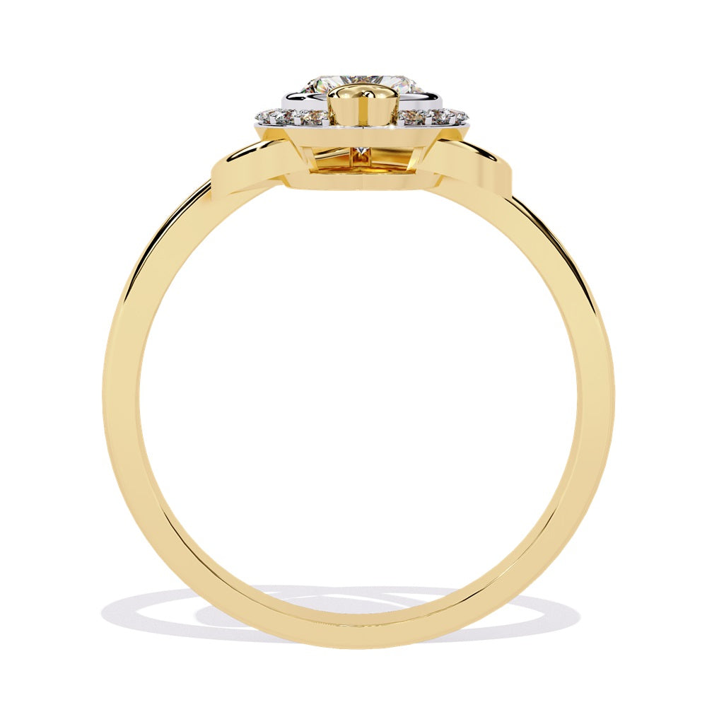 A heart-shaped diamond ring in gold, featuring a solitaire design with a halo of smaller diamonds surrounding it.