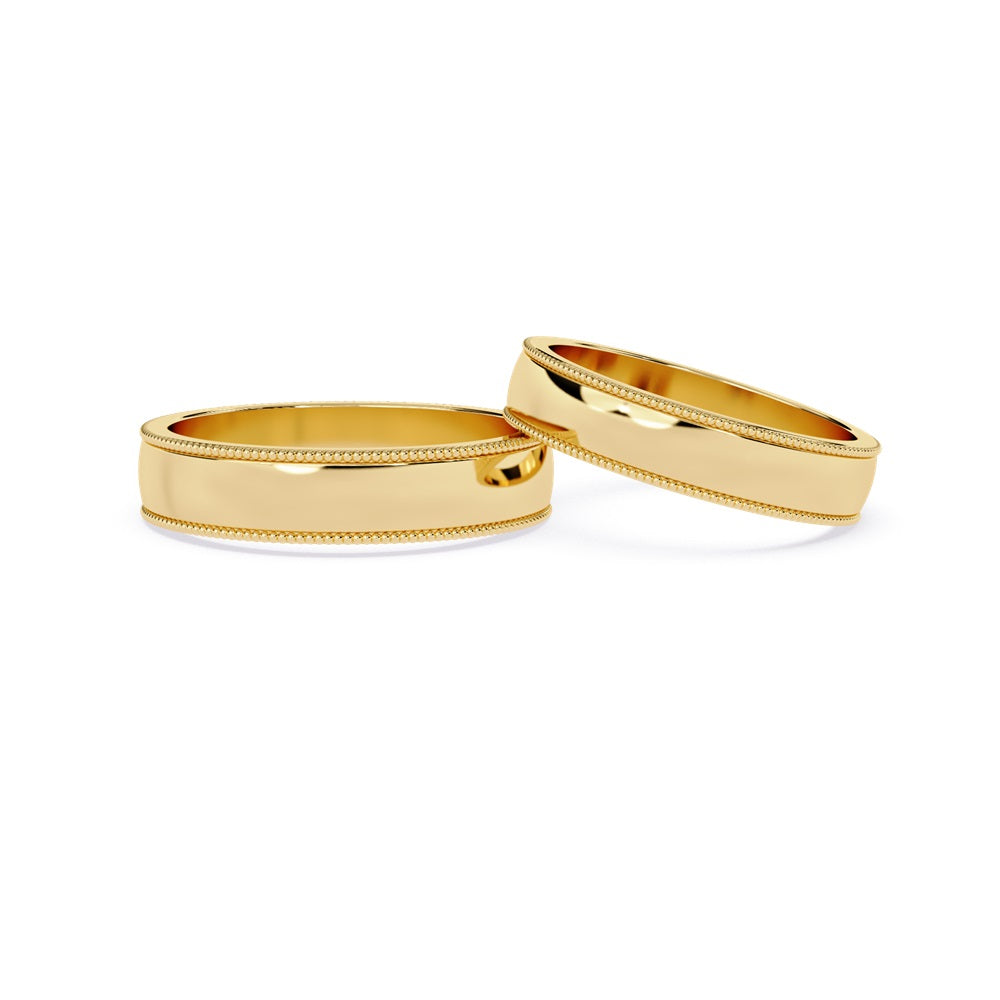 Two exquisite rose gold wedding bands, perfect for celebrating a couple's union.
