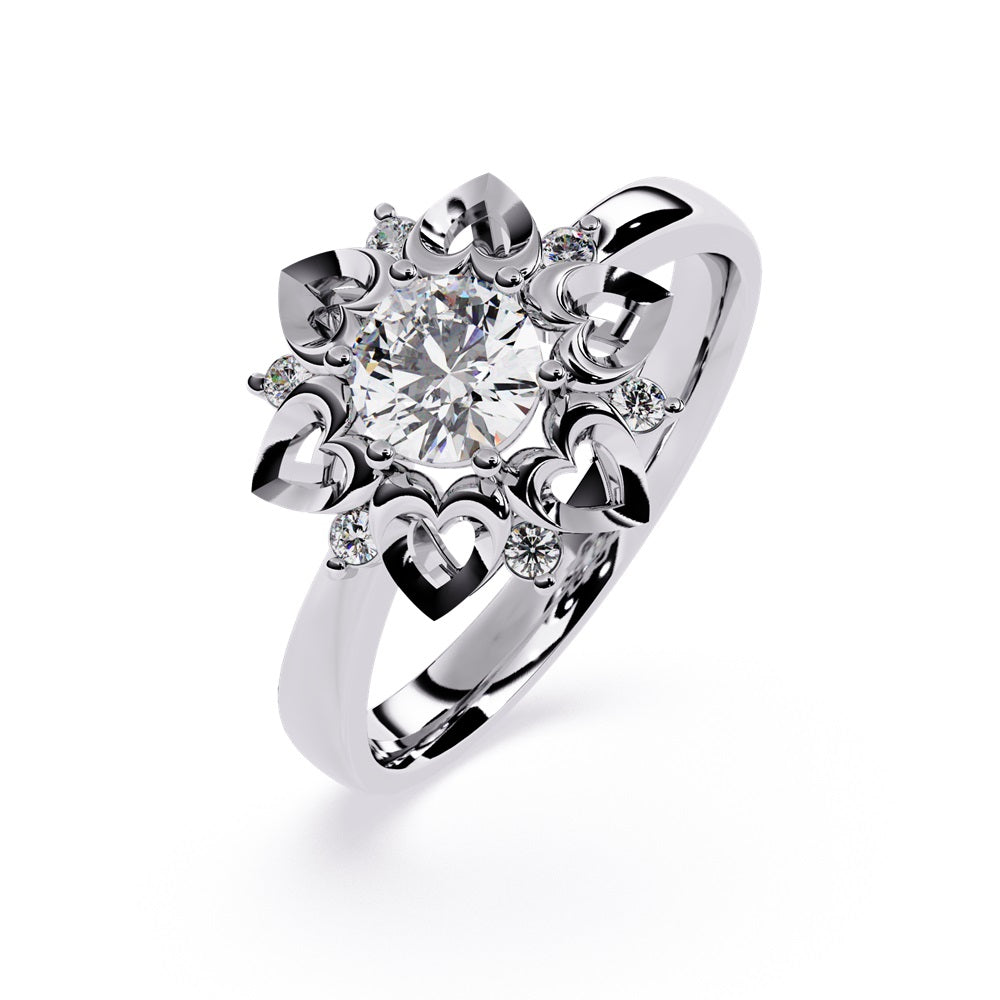 A floral engagement ring highlighted by a diamond center, complemented by heart-shaped petals for a delicate appearance.