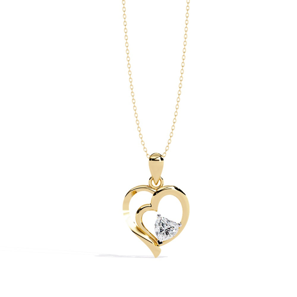 A gold and diamond heart pendant, elegantly designed to showcase its sparkling beauty and romantic appeal.