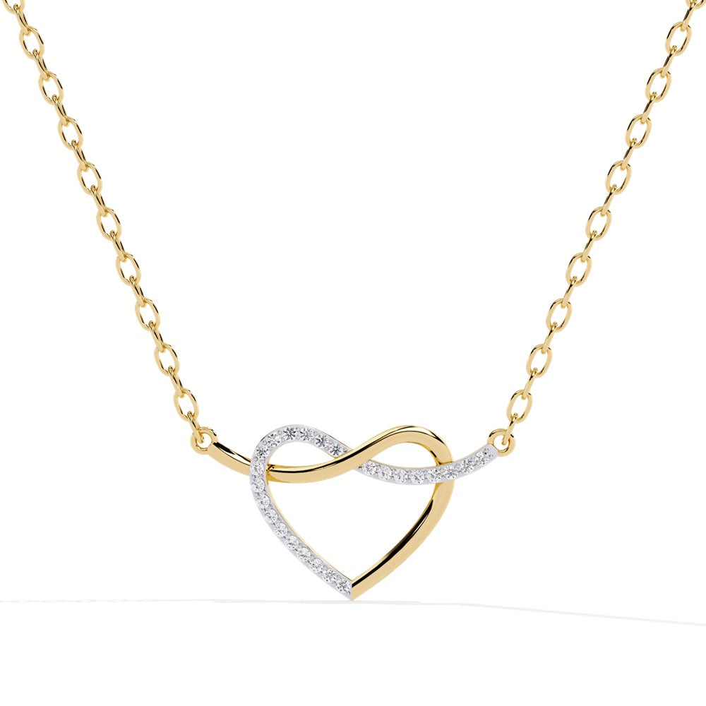 An exquisite gold pendant in the shape of a heart, featuring shimmering diamonds that enhance its romantic allure.