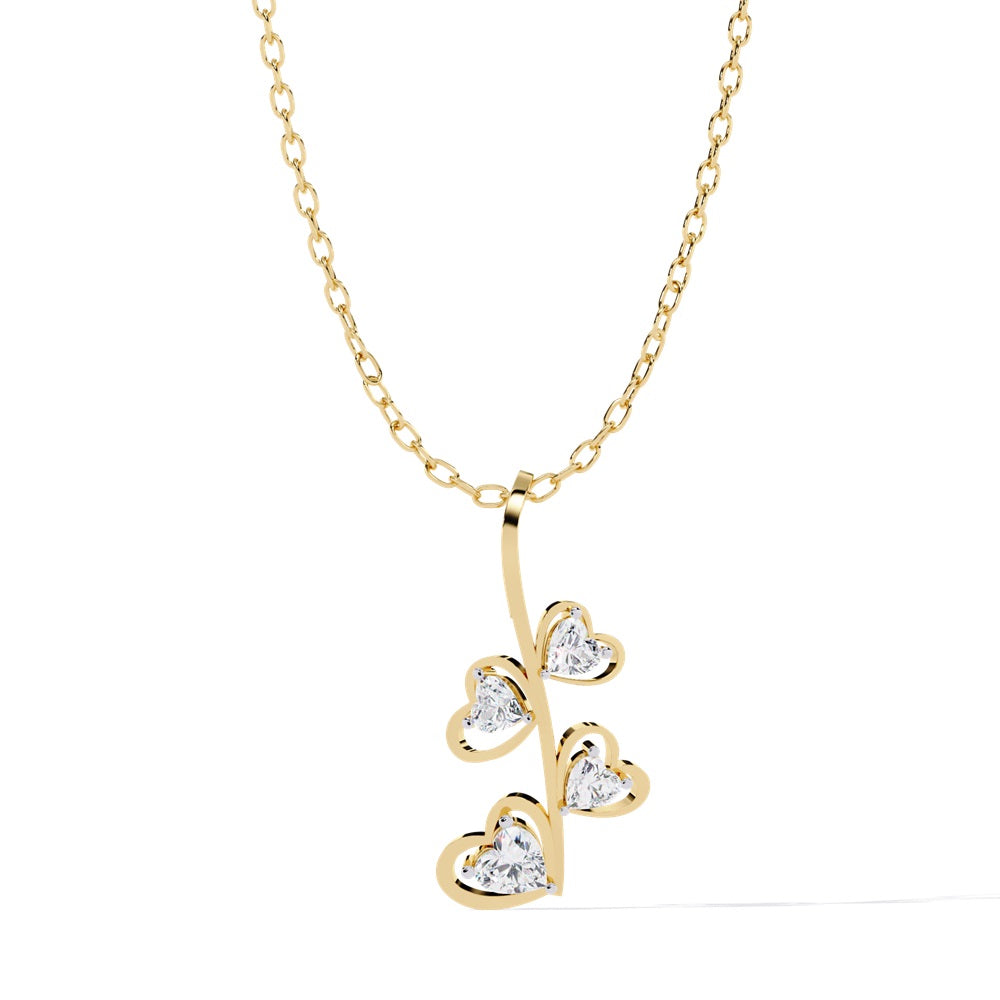The Niraa Spring Heart Shape Diamond Solitaire Pendant is a stunning gold necklace with a delicate chain and branch-shaped pendant, each heart-shaped leaf adorned with clear, sparkling stones for added elegance and charm.