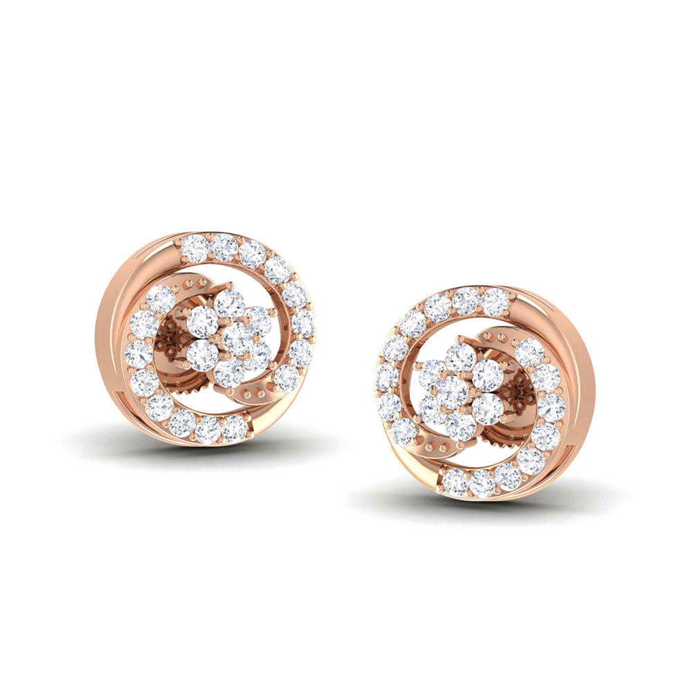 The Caledonia Diamond Earrings by Niraa feature elegant circular designs with gold and silver accents, showcasing a central flower-like cluster of clear gemstones. Intertwining loops adorned with sparkling gems add sophistication to any ensemble.