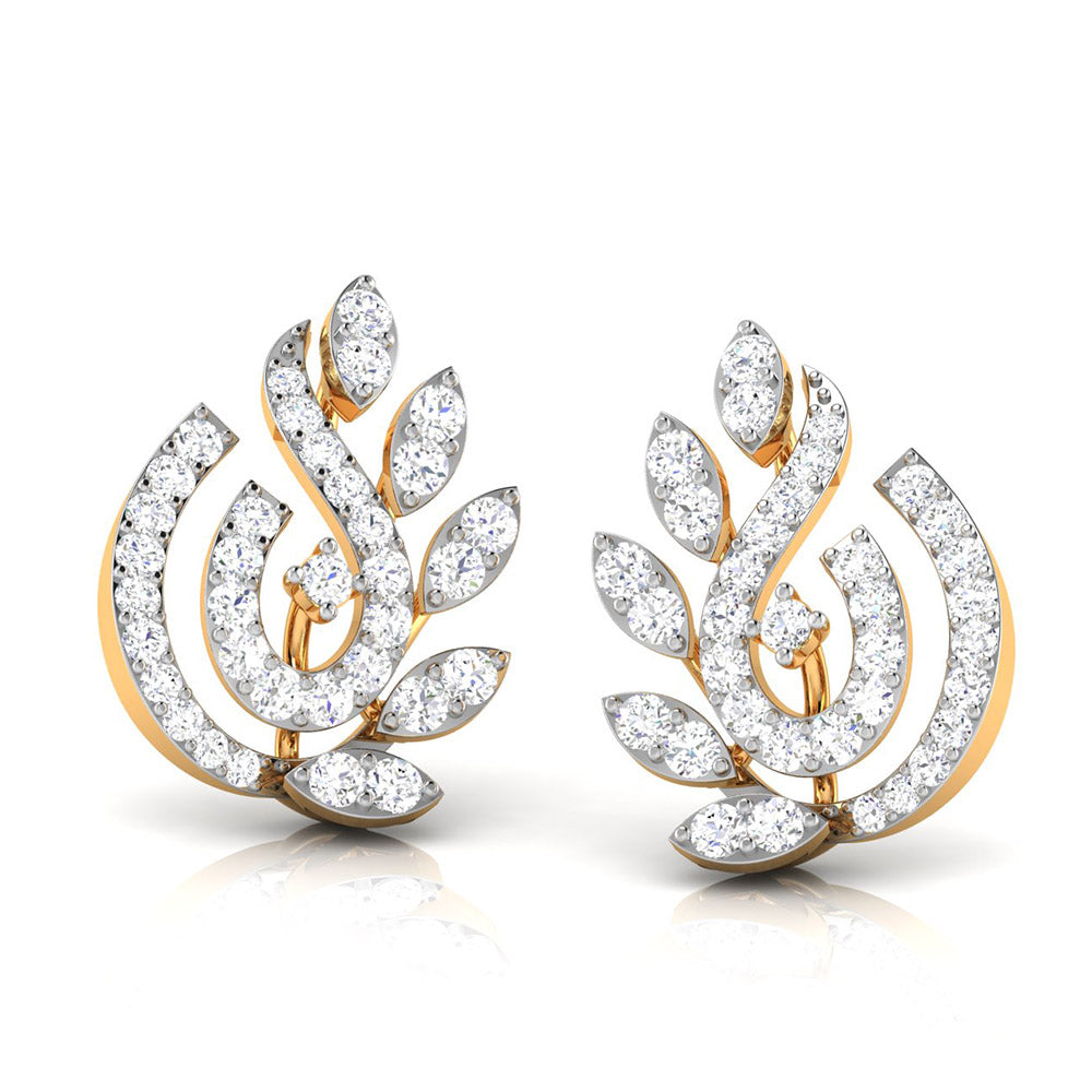 The Coretta Diamond Earring by Niraa features a swirling design with small diamonds and leaf-like elements, perfect for adding elegance and sophistication to any plain white backdrop.