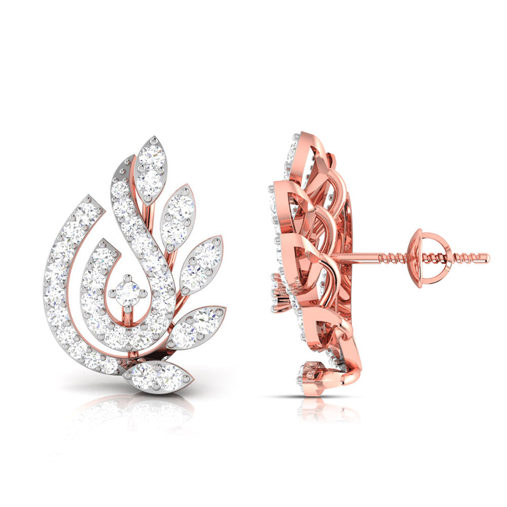 The Coretta Diamond Earring by Niraa features a swirling design with small diamonds and leaf-like elements, perfect for adding elegance and sophistication to any plain white backdrop.