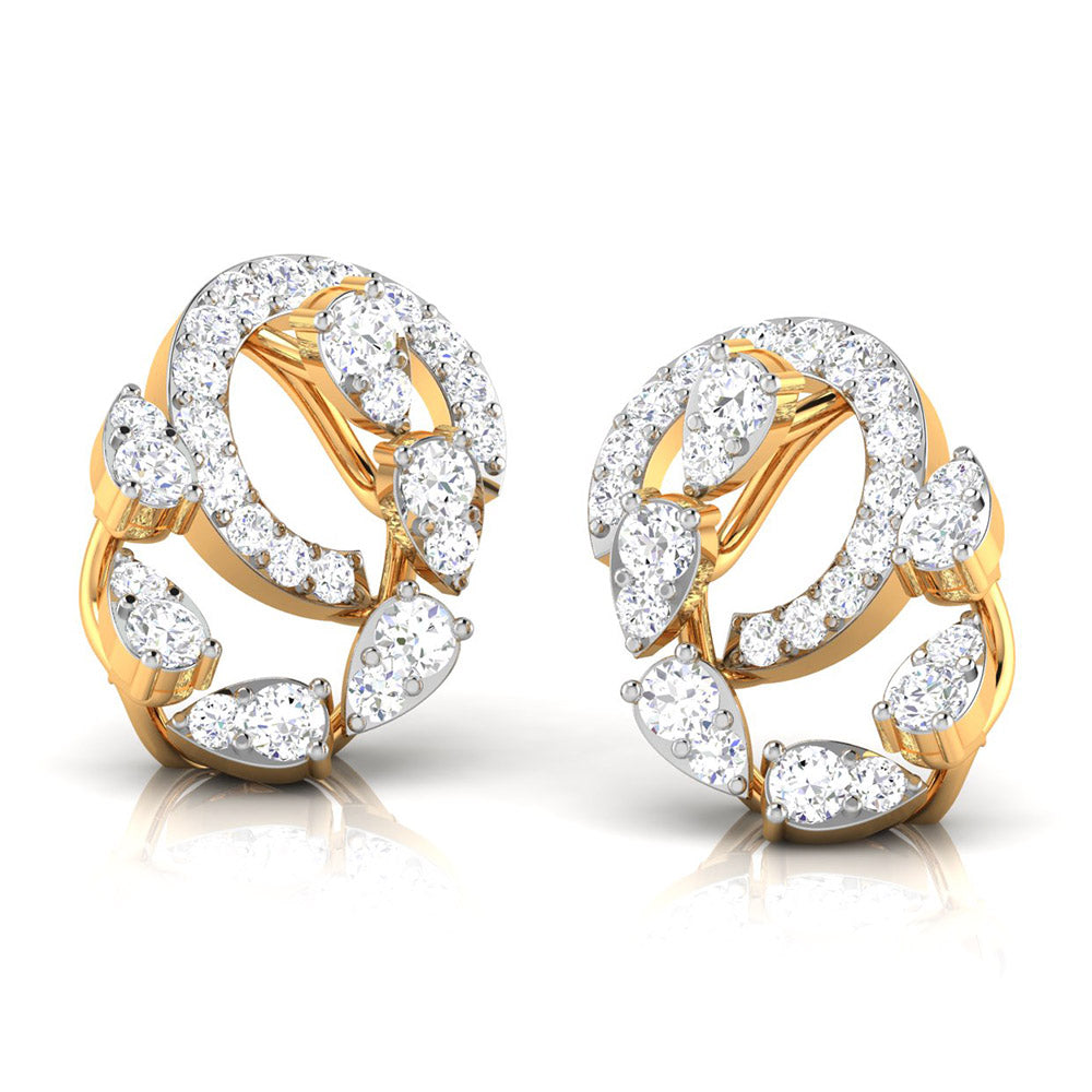 The Daniella Diamond Earrings by Niraa feature intricate loops with pear-shaped and round white gemstones. Their intertwining patterns exude luxury and elegance against a pristine white background.