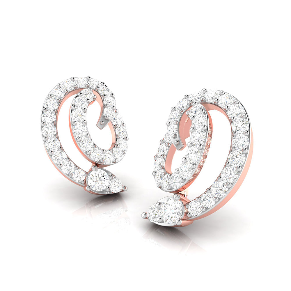 The Eleanor Diamond Earring by Niraa features a spiral design with small diamonds adorning the curves and teardrop-shaped diamonds at each end, adding elegance and sparkle to this exquisite piece.
