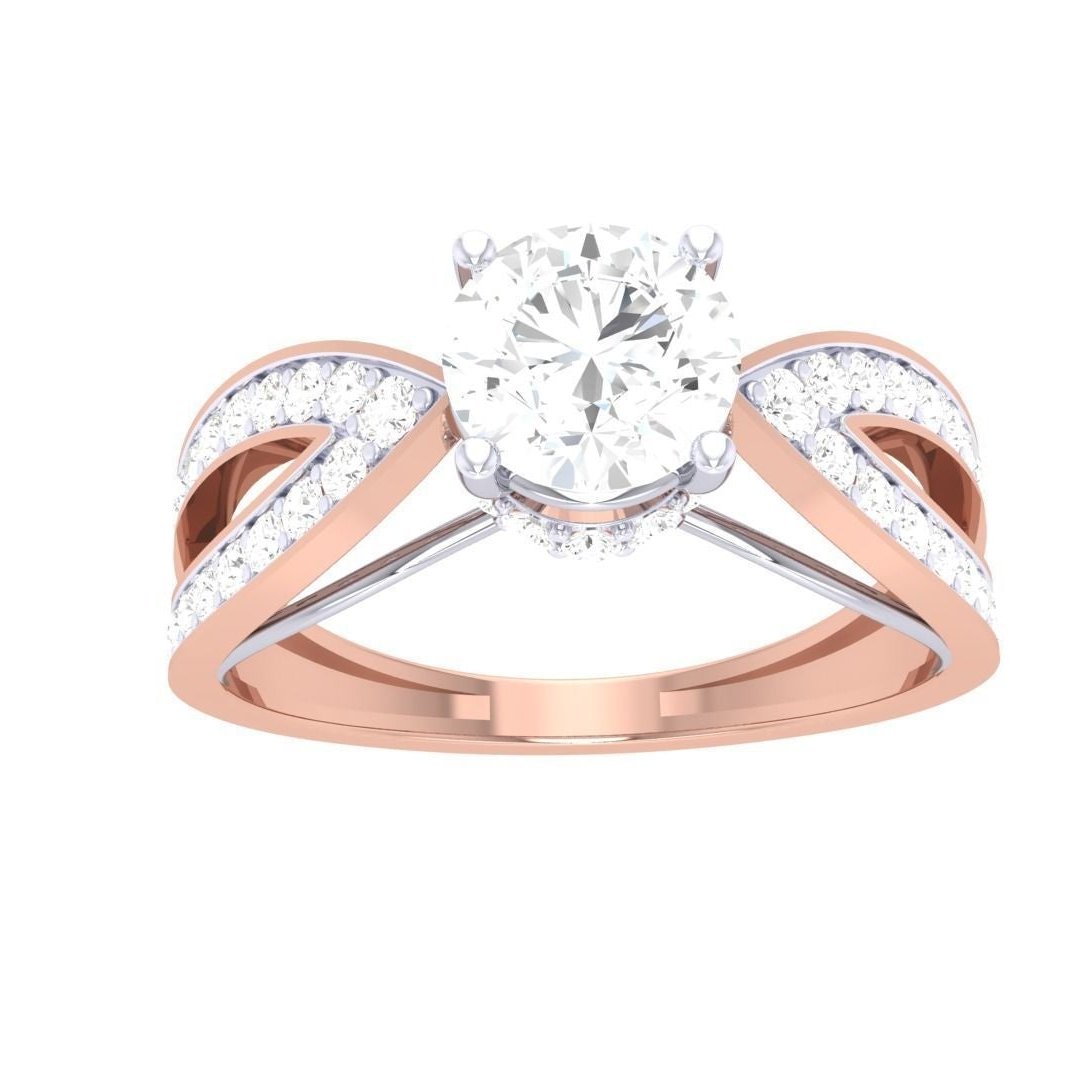 The Ruth Diamond Solitaire Ring by Niraa is a rose gold luxury piece featuring a round diamond in a four-prong setting. Its split shank band elegantly curves with small diamonds adding sparkle and sophistication.
