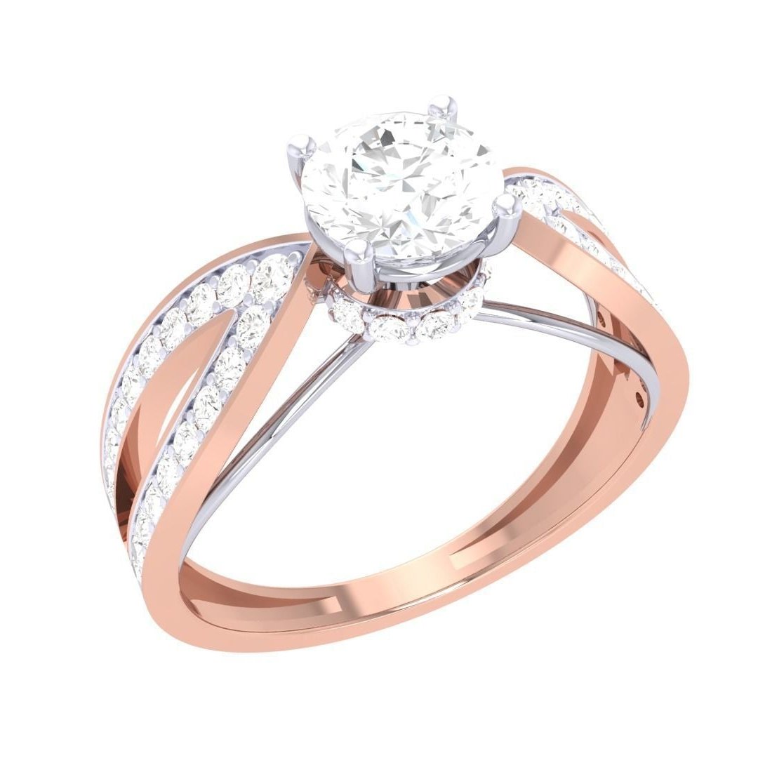 The Ruth Diamond Solitaire Ring by Niraa is a rose gold luxury piece featuring a round diamond in a four-prong setting. Its split shank band elegantly curves with small diamonds adding sparkle and sophistication.