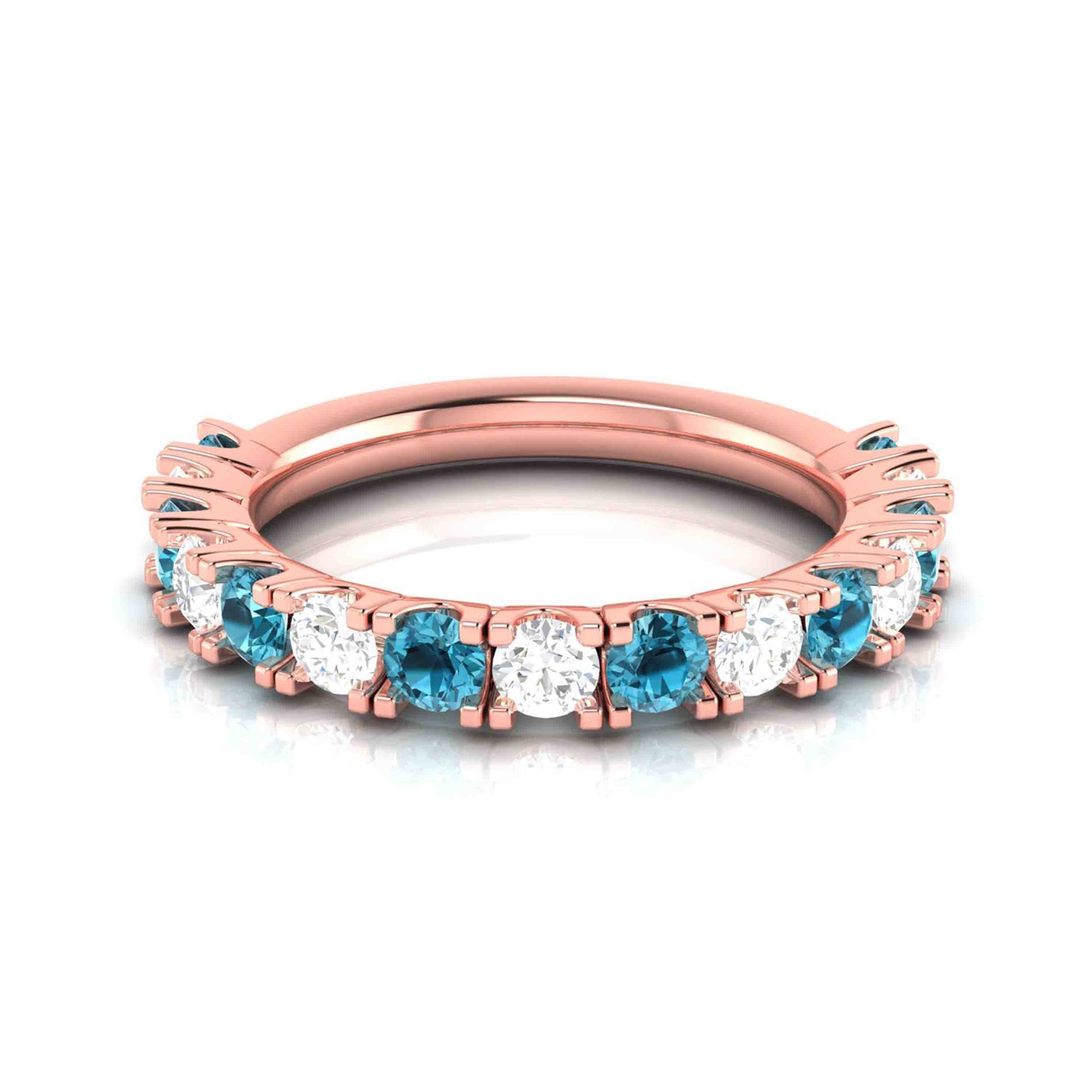 The Daphne Diamond Ladies Ring by Niraa is a rose gold piece adorned with a full circle of small, round diamonds in a prong setting, creating a sparkling effect. Set against a white background, it highlights the intricate details and luxurious appearance of the ring.