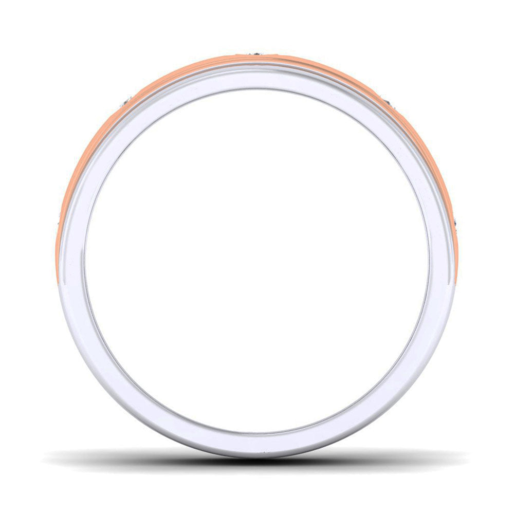 The Maeve Diamond Ladies Ring by Niraa features a captivating two-tone design with a rose gold outer band adorned with round diamonds and a silver inner band, beautifully displayed on a white background.