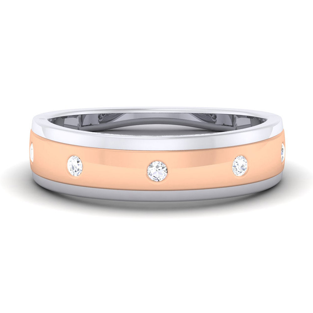 The Maeve Diamond Ladies Ring by Niraa features a captivating two-tone design with a rose gold outer band adorned with round diamonds and a silver inner band, beautifully displayed on a white background.