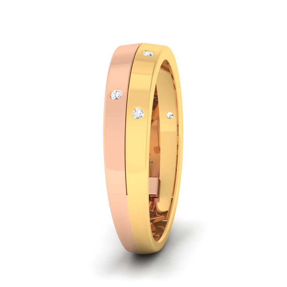 Experience elegance with the Niraa Odessey Diamond Ladies Ring. This ring features a gold and rose gold band adorned with small diamonds, exuding a dazzling sparkle perfect for any occasion.
