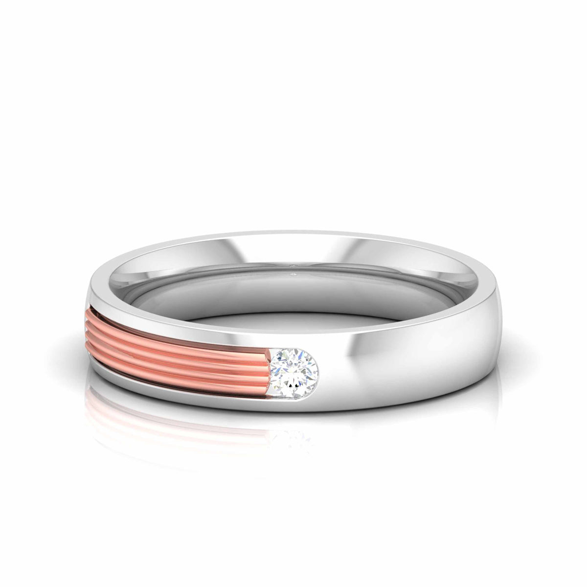 Displayed against a white background, two Irene Diamond Ladies Rings by Niraa feature sleek gold accents and small diamonds. The polished finish subtly reflects light, with one ring leaning against the other to highlight their modern design.