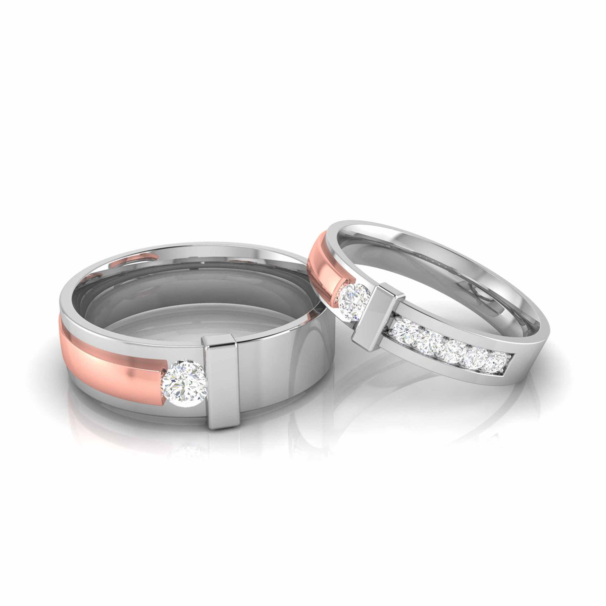 Discover the Siena Diamond Solitaire Ring by Niraa: A stunning two-tone design featuring a gold band on the left and silver on the right, both detailed with dazzling diamonds. The certified central round diamond shines brilliantly, complemented by smaller stones that reflect light beautifully.