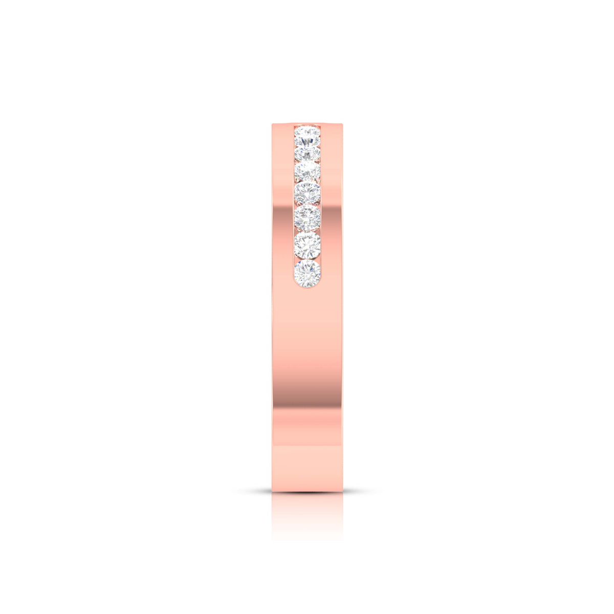 The Zariyah Diamond Ladies Ring by Niraa rests elegantly on a reflective surface, its slim band adorned with small embedded diamonds. Contrasting with the wider grooved silver ring beside it, both showcase a polished finish, embodying elegance and timeless beauty.