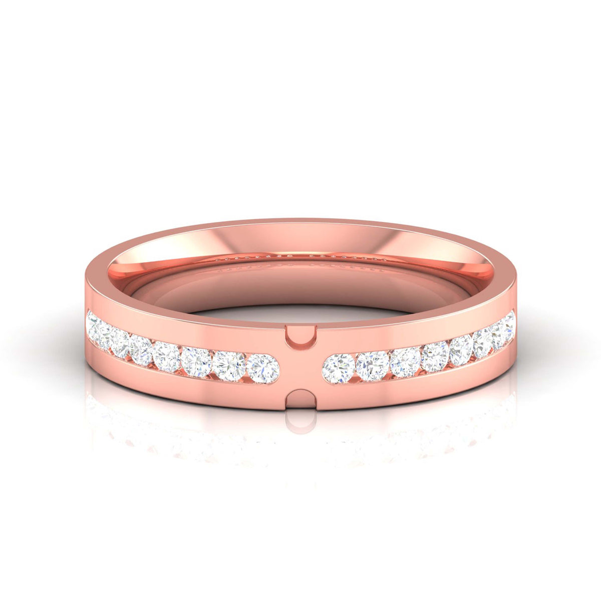 The Zariyah Diamond Ladies Ring by Niraa rests elegantly on a reflective surface, its slim band adorned with small embedded diamonds. Contrasting with the wider grooved silver ring beside it, both showcase a polished finish, embodying elegance and timeless beauty.