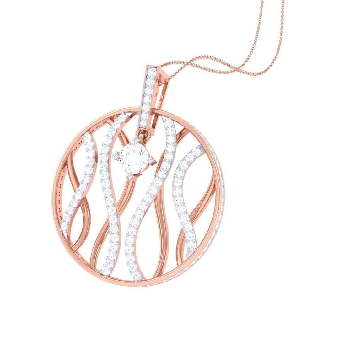 The Ensley Diamond Pendant by Niraa is gold with an intricate wavy design featuring white stones and a central, larger gemstone. It hangs elegantly from a delicate gold chain, showcasing exquisite craftsmanship and attention to detail.