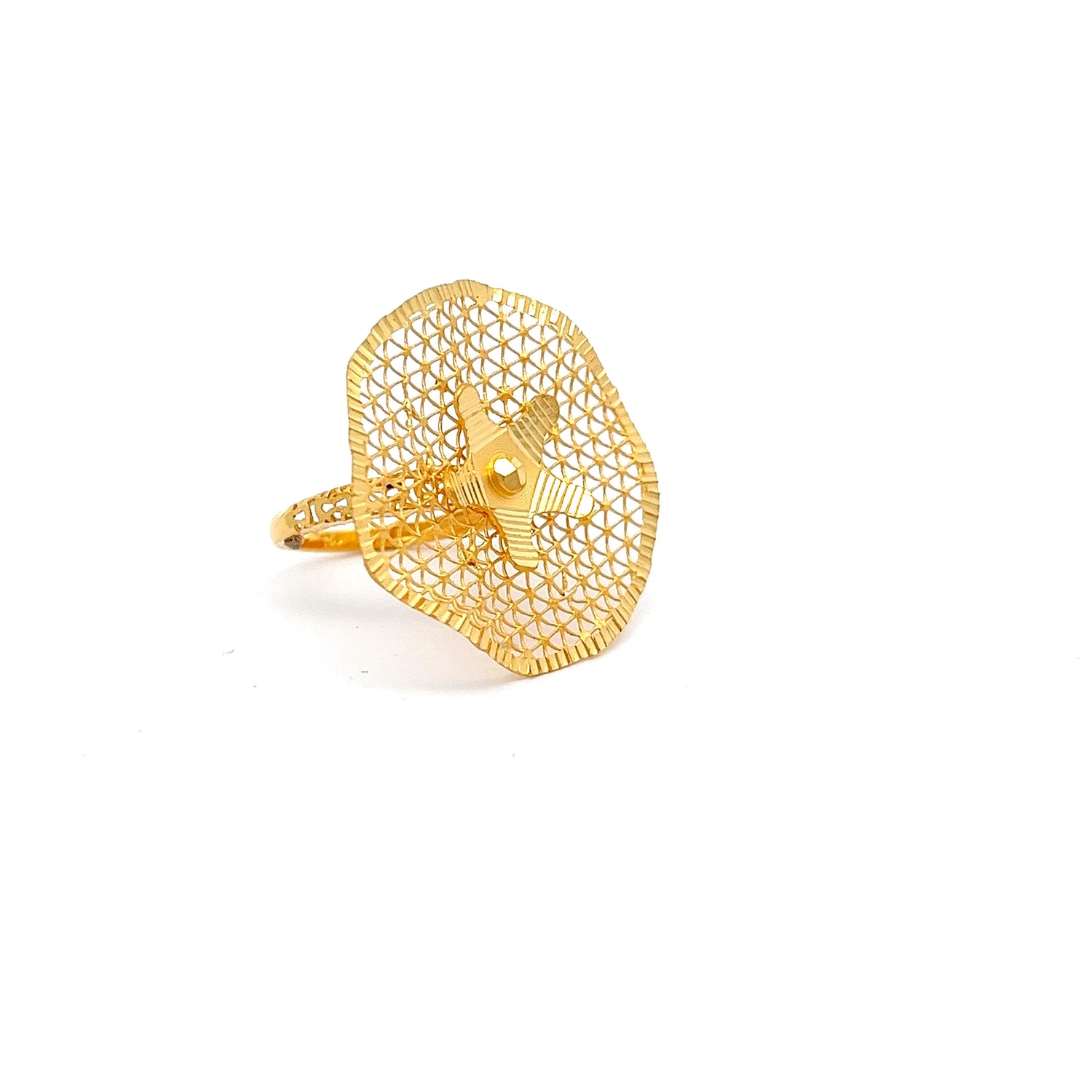 The Colette Gold Ring by Niraa features a luxurious round design with a central five-pointed star. Its intricate gold mesh creates a delicate and elegant appearance, making it an exquisite accessory against a plain white background.