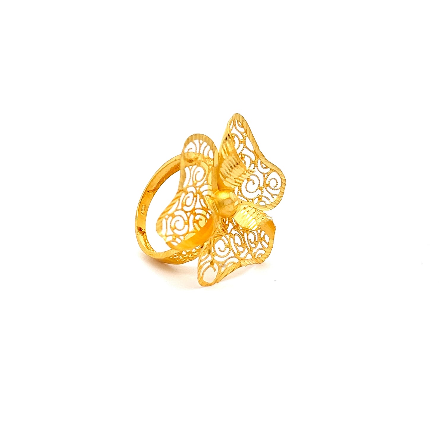 This luxurious gold plumeria flower brooch features intricate swirling cutout designs on each petal, reminiscent of the Niraa Alannah Gold Ring, and is set against a plain white background.