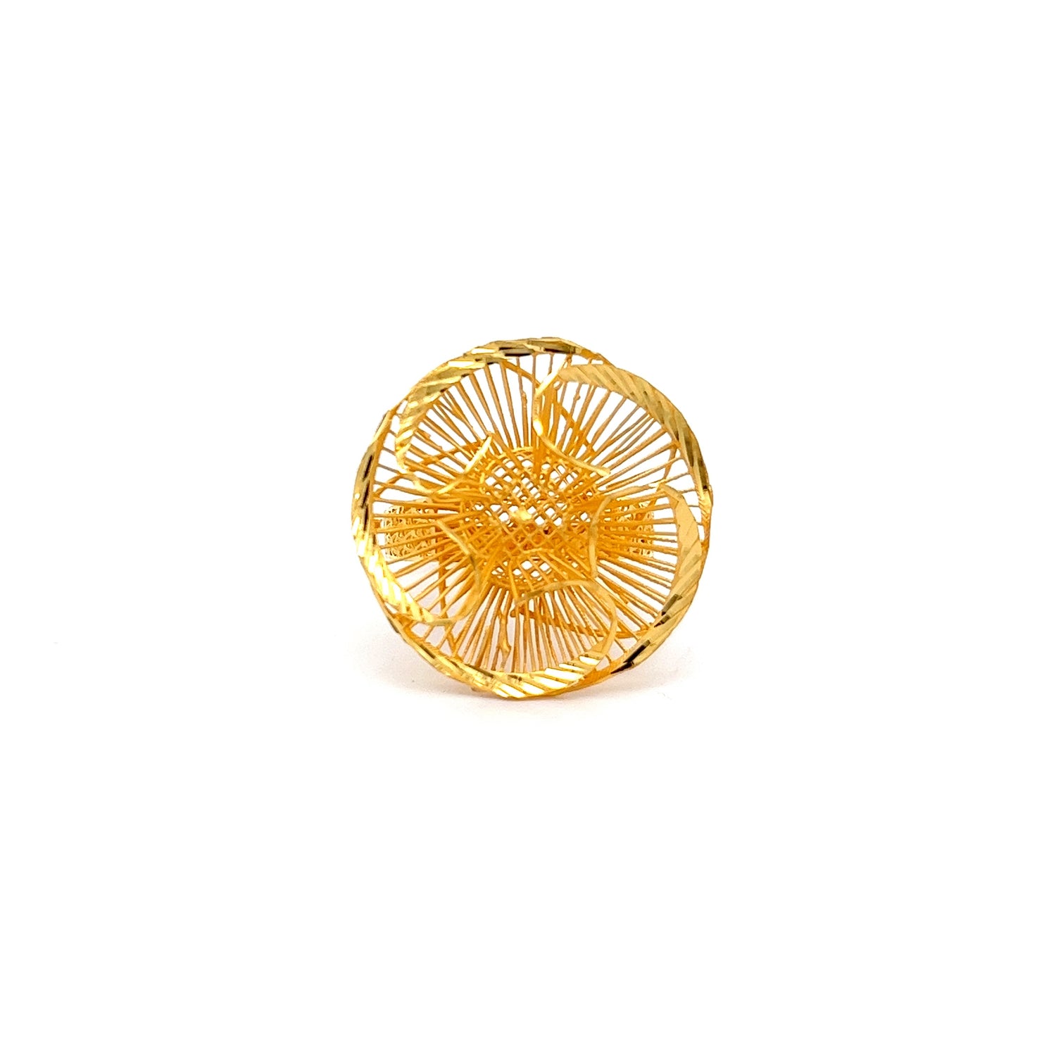 The Niraa Shay Gold Ring showcases luxury with its intricate, circular woven design and geometric centerpiece. Delicate golden strands form a symmetrical structure, reminiscent of a fine sculpture, set against a plain white background.