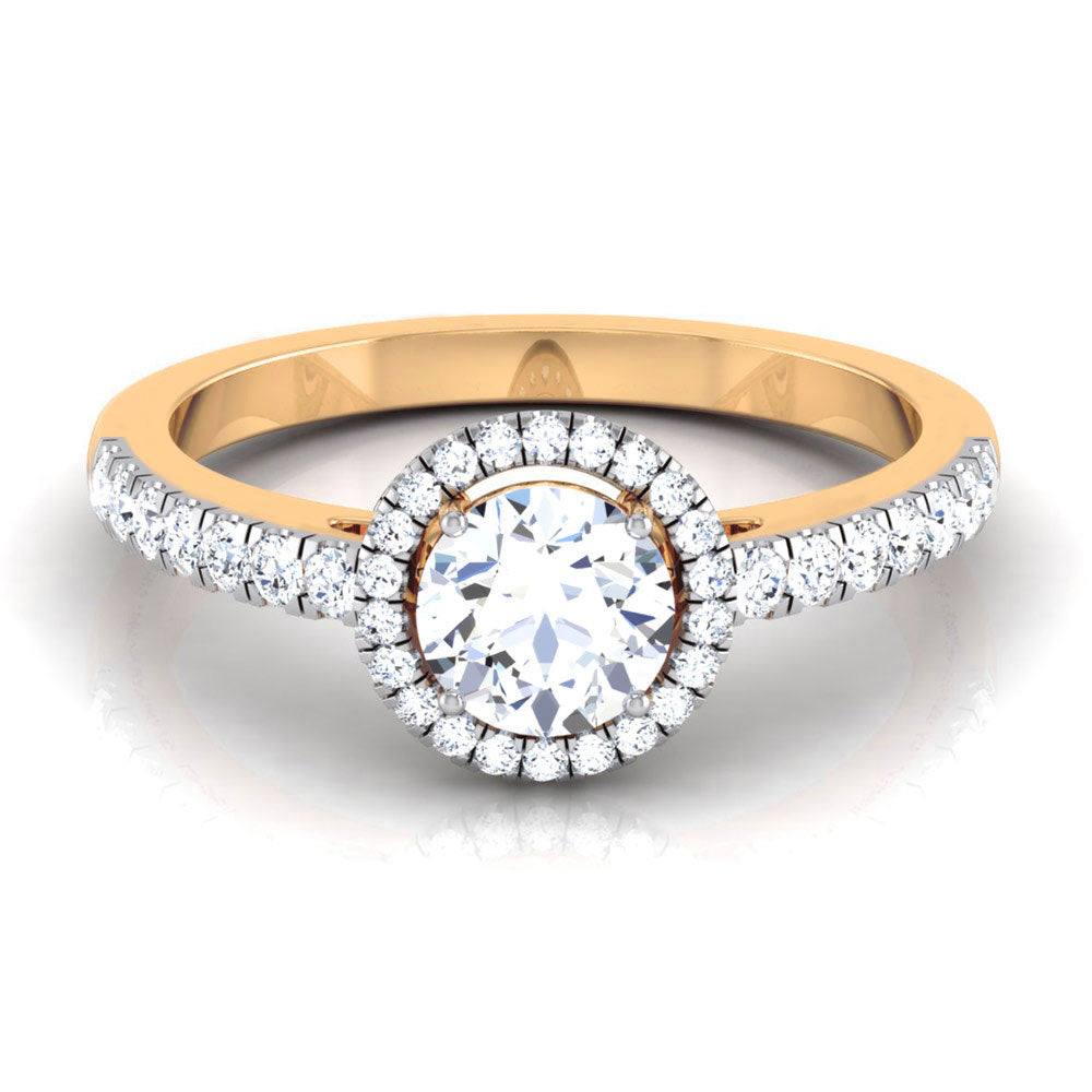The Gloria Diamond Solitaire Ring by Niraa is a stunning gold engagement ring with a large round diamond surrounded by a shimmering halo of smaller diamonds. The elegantly designed band features additional diamonds on its upper half, forming an exquisite symbol of love and commitment.