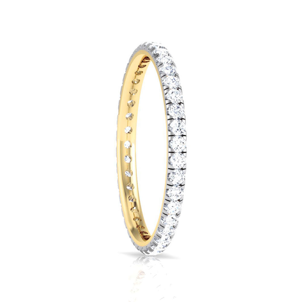The Titania Diamond Ladies Ring by Niraa showcases a gold eternity band with a continuous circle of sparkling diamonds and includes a diamond certificate for authenticity, adding confidence to your shine.