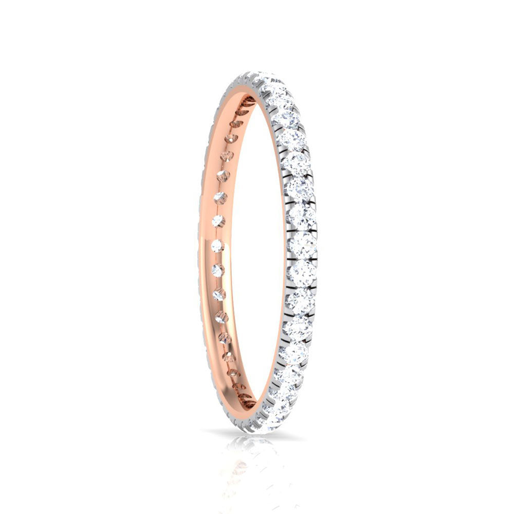 The Titania Diamond Ladies Ring by Niraa showcases a gold eternity band with a continuous circle of sparkling diamonds and includes a diamond certificate for authenticity, adding confidence to your shine.