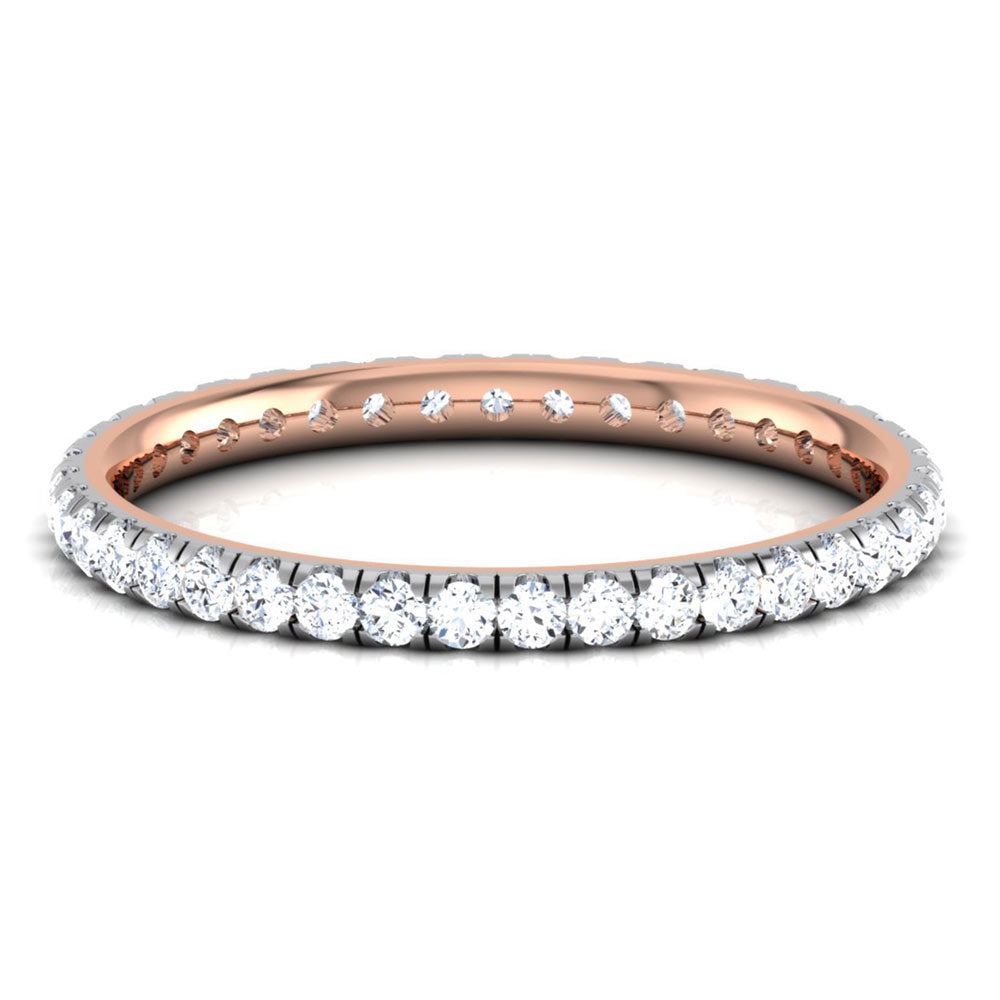 The Titania Diamond Ladies Ring by Niraa showcases a gold eternity band with a continuous circle of sparkling diamonds and includes a diamond certificate for authenticity, adding confidence to your shine.