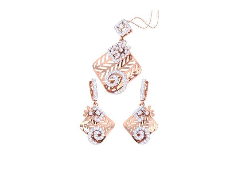 The Mireille Diamond Pendant Set by Niraa features a rose gold design with floral and geometric patterns, enhanced with dazzling white stones. Set against a white backdrop, this exquisite jewelry epitomizes elegance and timeless charm.
