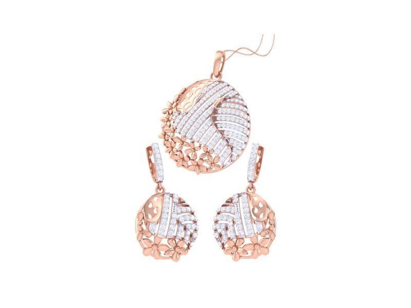 The Odette Diamond Pendant Set by Niraa features a rose gold pendant and matching earrings with intricate white and rose gold designs, adorned with clear crystals. The circular pendant and dangling earrings form an elegant ensemble for any occasion.