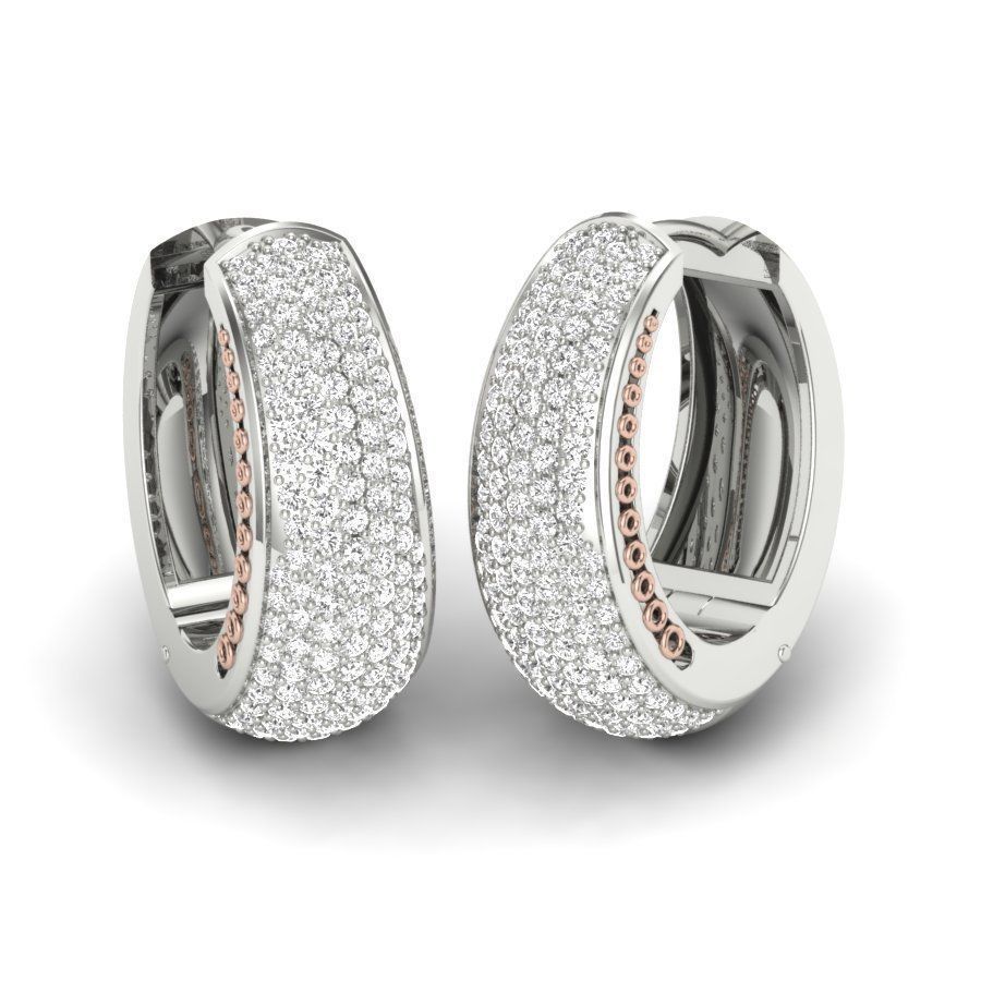 The Jemima Diamond Earring by Niraa is an elegant pair of hoop earrings with a white gold base, encrusted with small diamonds and lined with pink gold accents on the inner edge. Please let us know if you need additional information!.