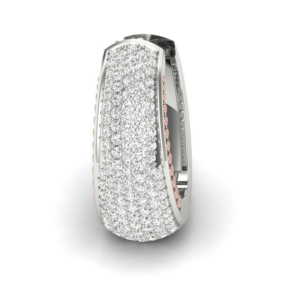 The Jemima Diamond Earring by Niraa is an elegant pair of hoop earrings with a white gold base, encrusted with small diamonds and lined with pink gold accents on the inner edge. Please let us know if you need additional information!.