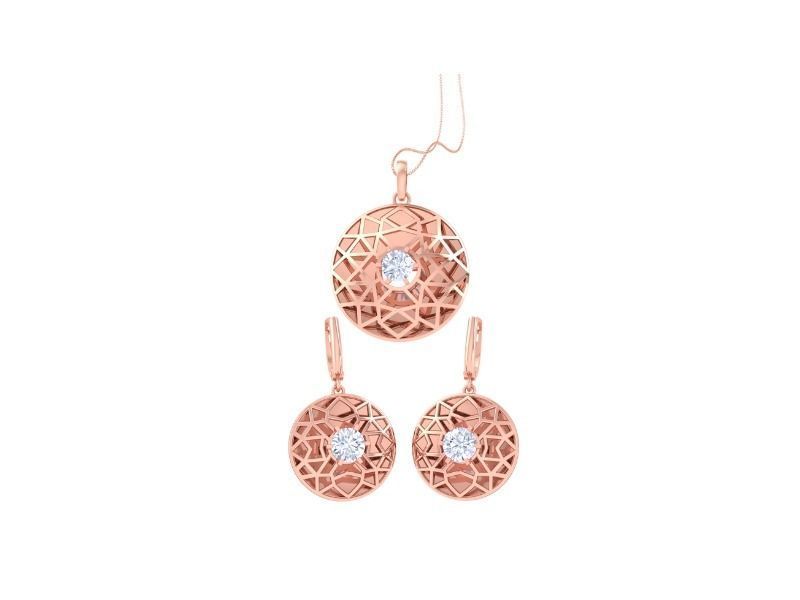 The Riley Diamond Solitaire Pendant Set by Niraa features rose gold jewelry, including a pendant with a diamond solitaire on a fine chain and matching earrings. Each piece showcases a geometric lattice design around a central clear stone, and the earrings have lever back closures.