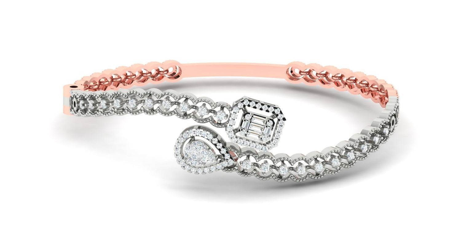 The Annalee Diamond Bracelet by Niraa features dual-tone metals with intricate designs. One end has an oval, teardrop-shaped setting and the other an octagonal form, both accented with sparkling stones for a classic and modern artistic blend.