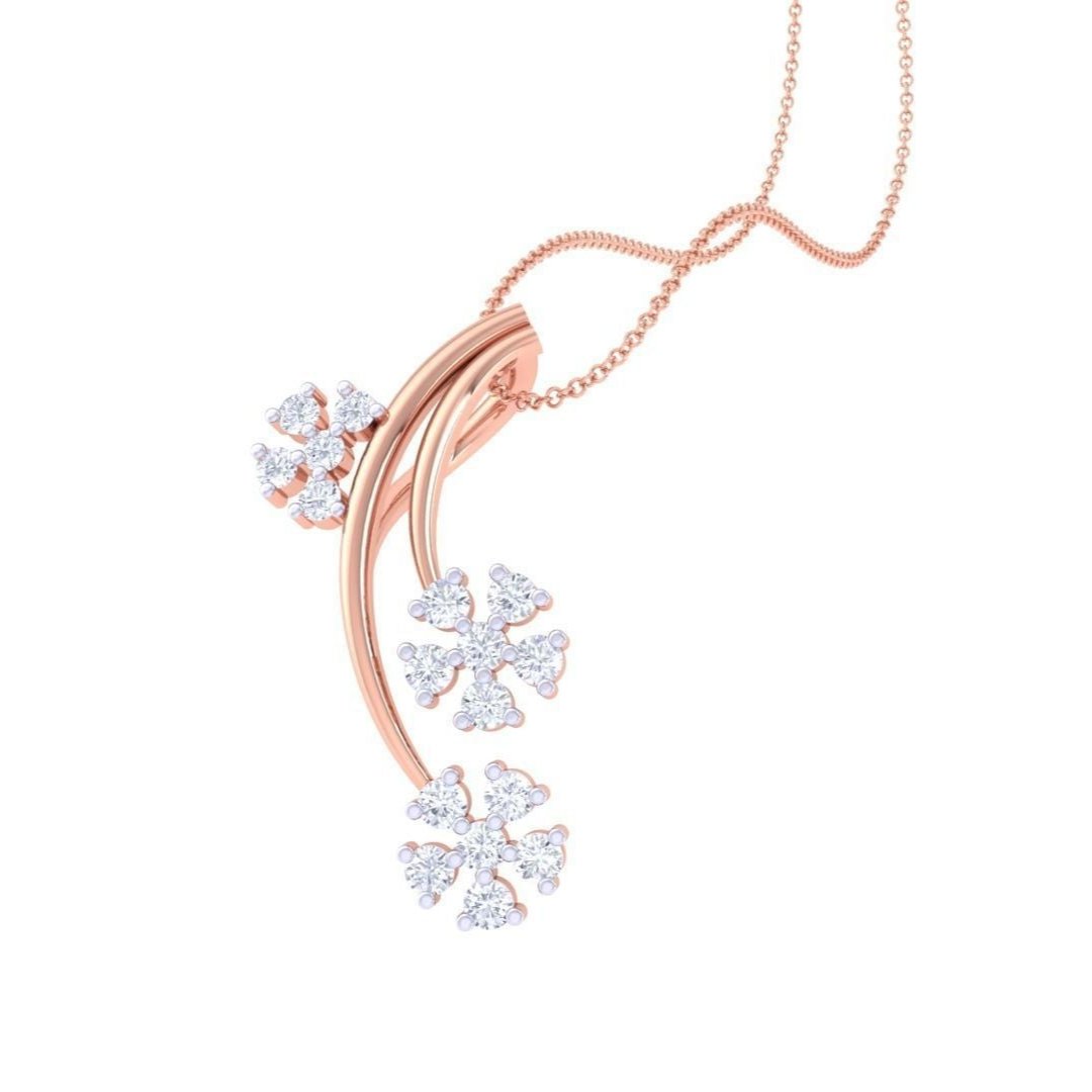 The Janiyah Diamond Pendant by Niraa features three floral designs made from tiny sparkling stones, each connected by a smooth curved stem and suspended elegantly on a fine gold chain.
