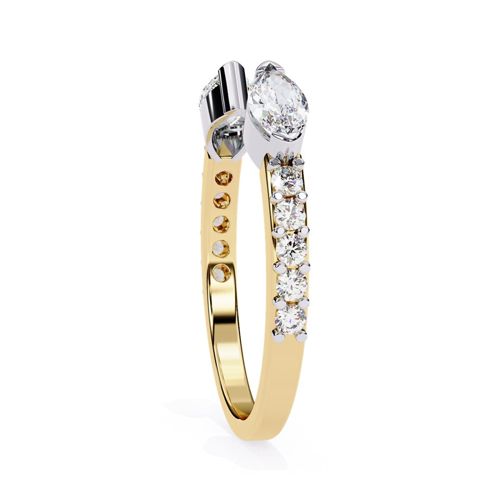 The Niraa Marquise Diamond Open Band is a luxury accessory with gold and silver featuring large marquise-cut diamonds at each end. Smaller rectangular diamonds sparkle on the sides, set against a plain white background.