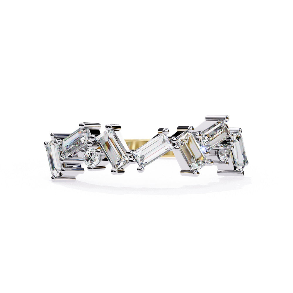 The Constellation Diamond Band by Niraa is a gold ring showcasing a geometric zigzag pattern with rectangular, clear baguette-cut stones and a diamond band touch, exuding modern elegance.