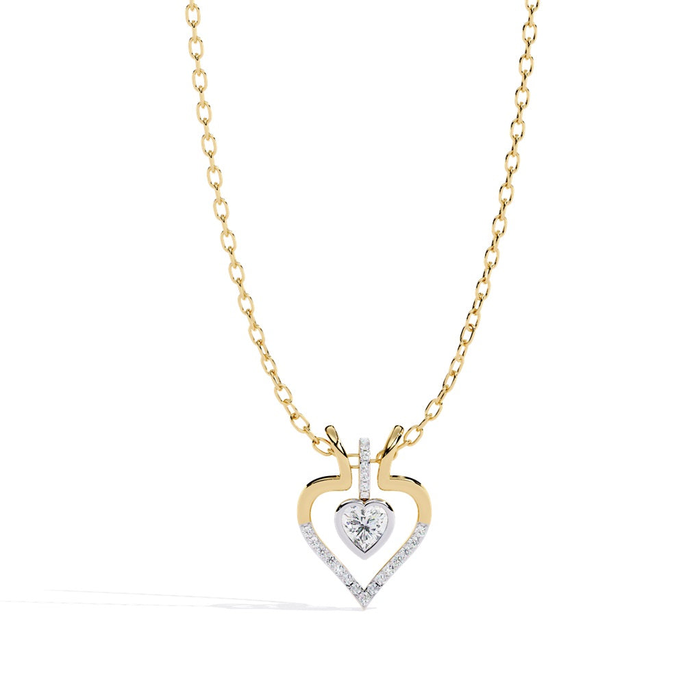A diamond heart pendant necklace in gold featuring a stunning solitaire diamond centerpiece.